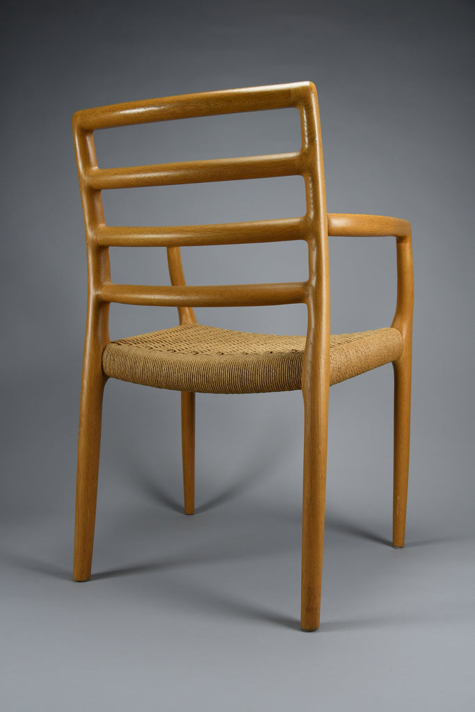 Niels Otto Møller model 68 Oak & papercord armchair J.L. Møllers Møbelfabrik 1981 - Furniture